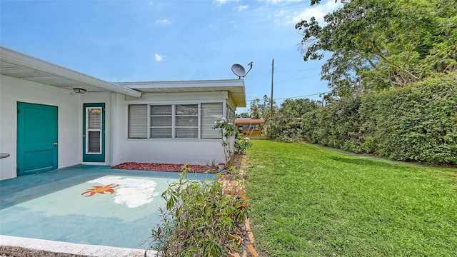 2088 Grove St, Sarasota, FL 34239 - property entrance featuring a lawn and a patio