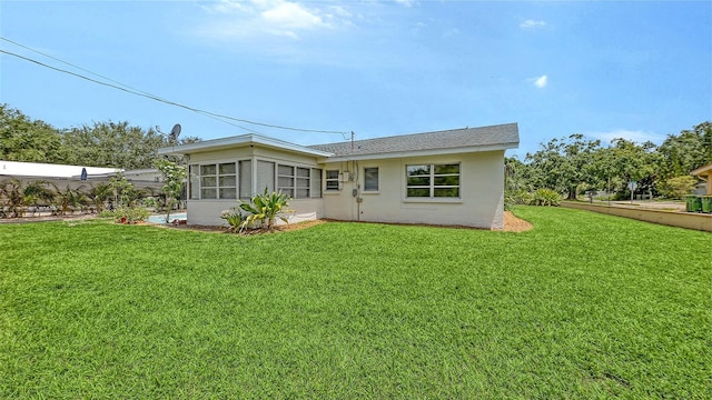 2088 Grove St, Sarasota, FL 34239 - back of house featuring a yard