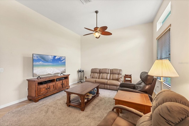 6312 41st Ct E, Sarasota, FL 34243 - living room with a ceiling fan, high vaulted ceiling, and light tile patterned flooring