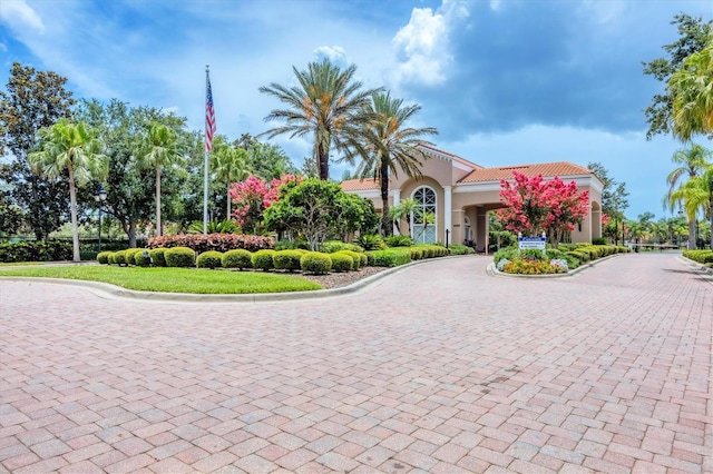 6312 41st Ct E, Sarasota, FL 34243 - view of building exterior with curved driveway