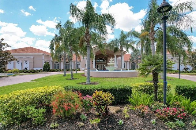 6312 41st Ct E, Sarasota, FL 34243 - mediterranean / spanish-style house featuring stucco siding and a front yard