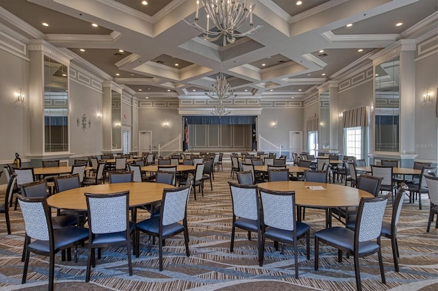 6312 41st Ct E, Sarasota, FL 34243 - dining space featuring a towering ceiling, a chandelier, carpet flooring, coffered ceiling, and ornamental molding