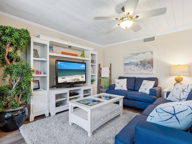 8710 Midnight Pass Rd Unit 205, Sarasota, FL 34242 - living room with wood finished floors, ornamental molding, and a ceiling fan