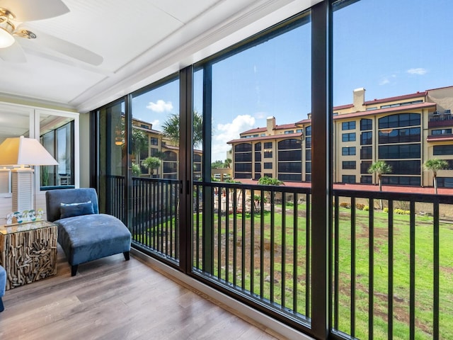 8710 Midnight Pass Rd Unit 205, Sarasota, FL 34242 - sunroom / solarium with a ceiling fan and wood finished floors