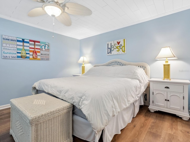 8710 Midnight Pass Rd Unit 205, Sarasota, FL 34242 - bedroom featuring ornamental molding, wood finished floors, and ceiling fan