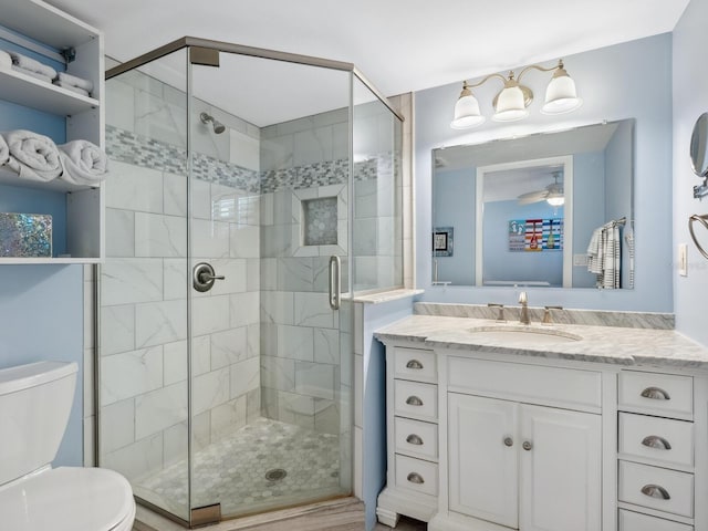 8710 Midnight Pass Rd Unit 205, Sarasota, FL 34242 - full bathroom featuring vanity, a shower stall, and a ceiling fan