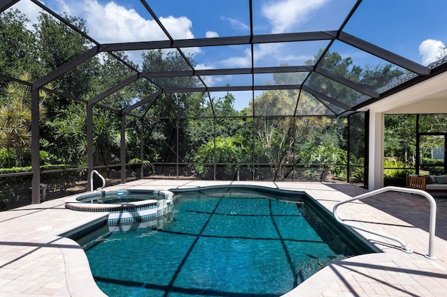 7211 Marston Ct, University Park, FL 34201 - view of swimming pool featuring a pool with connected hot tub, a patio area, and glass enclosure