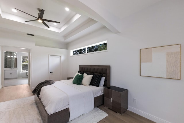 7211 Marston Ct, University Park, FL 34201 - bedroom with wood finished floors, recessed lighting, ensuite bath, and a raised ceiling