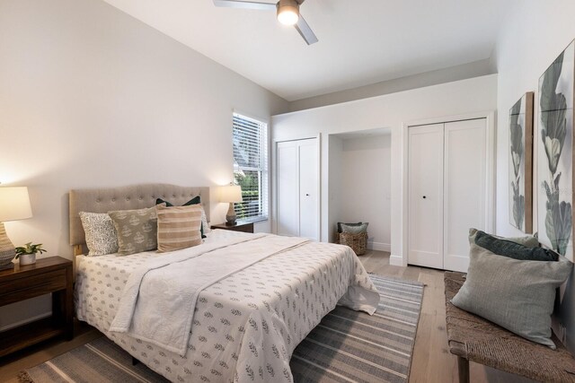 7211 Marston Ct, University Park, FL 34201 - bedroom with two closets, wood finished floors, and ceiling fan