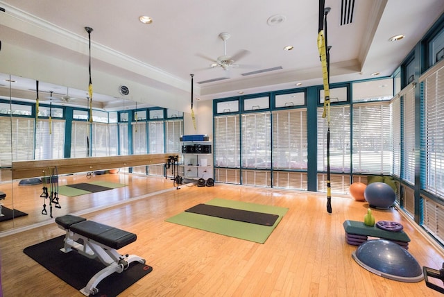 7211 Marston Ct, University Park, FL 34201 - gym featuring a raised ceiling, a ceiling fan, wood finished floors, crown molding, and recessed lighting