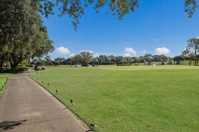 7211 Marston Ct, University Park, FL 34201 - surrounding community featuring a lawn