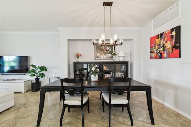 5916 Wake Forest Run Unit 101, Bradenton, FL 34211 - dining area with a chandelier and crown molding