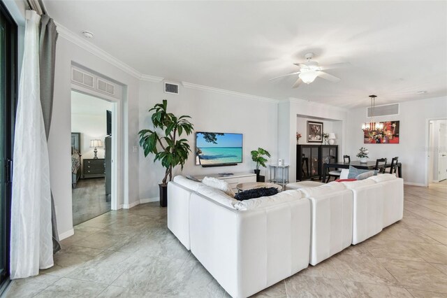 5916 Wake Forest Run Unit 101, Bradenton, FL 34211 - living area featuring a chandelier, ceiling fan, and ornamental molding