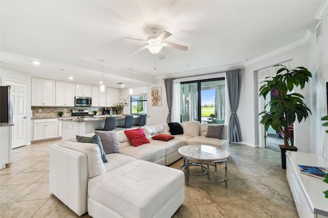 5916 Wake Forest Run Unit 101, Bradenton, FL 34211 - living area featuring a ceiling fan, crown molding, recessed lighting, and light tile patterned flooring