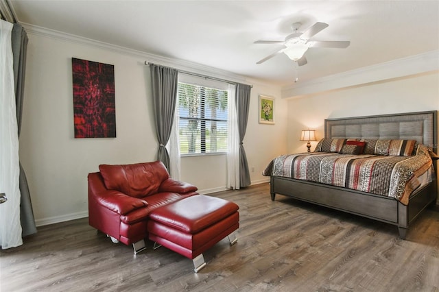 5916 Wake Forest Run Unit 101, Bradenton, FL 34211 - bedroom featuring ornamental molding, wood finished floors, and ceiling fan