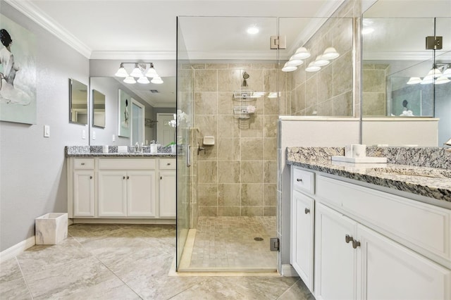 5916 Wake Forest Run Unit 101, Bradenton, FL 34211 - full bath featuring crown molding, a stall shower, two vanities, and a chandelier