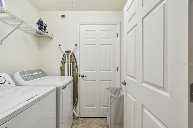 5916 Wake Forest Run Unit 101, Bradenton, FL 34211 - laundry area featuring separate washer and dryer and light tile patterned floors