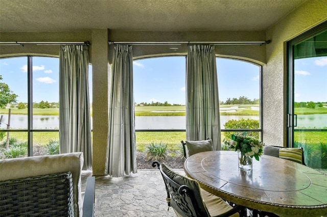 5916 Wake Forest Run Unit 101, Bradenton, FL 34211 - sunroom with a water view
