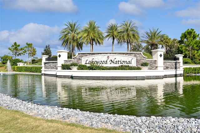 5916 Wake Forest Run Unit 101, Bradenton, FL 34211 - community sign featuring a water view
