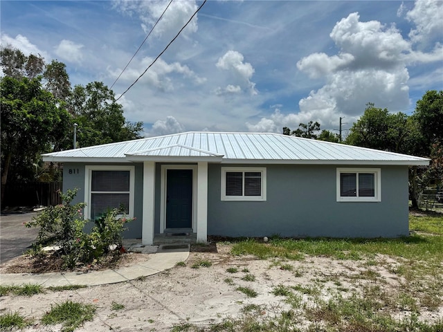 811 24th Street Ct E, Bradenton, FL 34208 - single story home featuring stucco siding and a metal roof