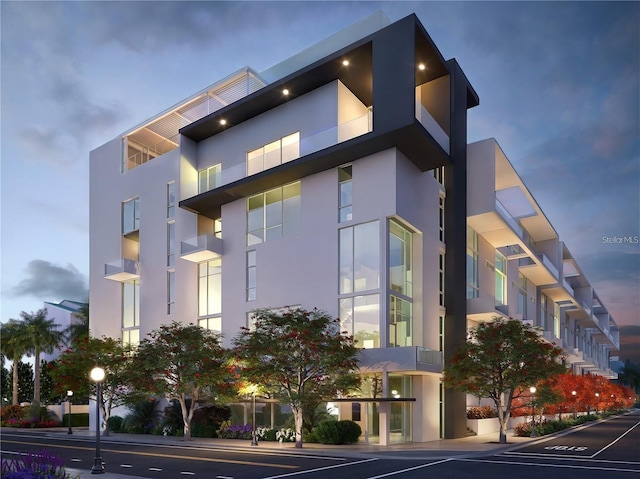 1305 4th St Unit 301G, Sarasota, FL 34236 - view of building exterior featuring uncovered parking