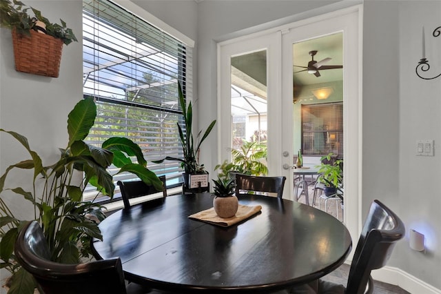 17426 Tailfeather Ct, Clermont, FL 34711 - dining area featuring ceiling fan and baseboards