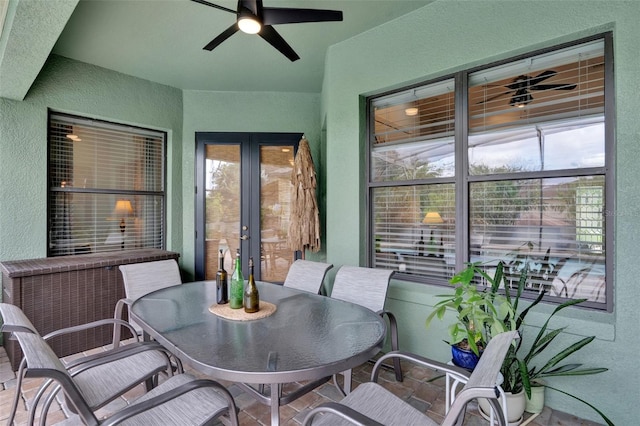 17426 Tailfeather Ct, Clermont, FL 34711 - sunroom featuring french doors, a ceiling fan, and outdoor dining space