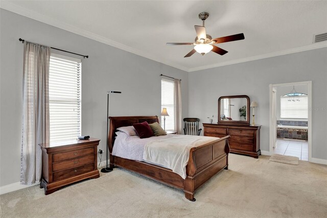 17426 Tailfeather Ct, Clermont, FL 34711 - bedroom with multiple windows, crown molding, light carpet, a ceiling fan, and connected bathroom