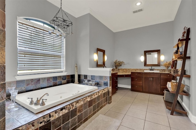 17426 Tailfeather Ct, Clermont, FL 34711 - full bath featuring vanity, a jetted tub, crown molding, tile patterned flooring, and a chandelier