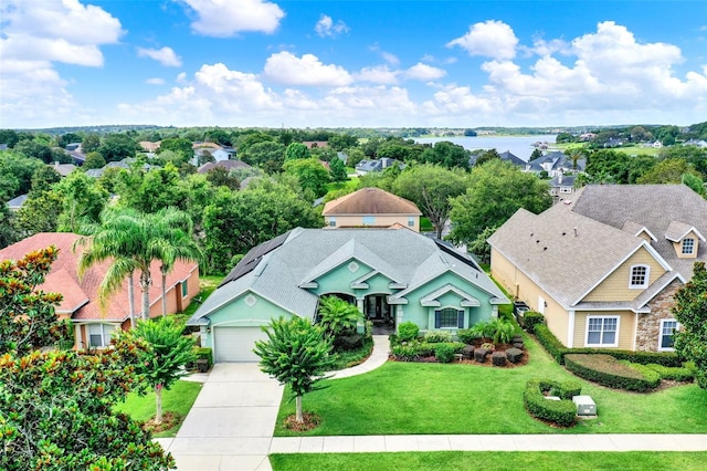 17426 Tailfeather Ct, Clermont, FL 34711 - aerial view of residential area featuring a large body of water
