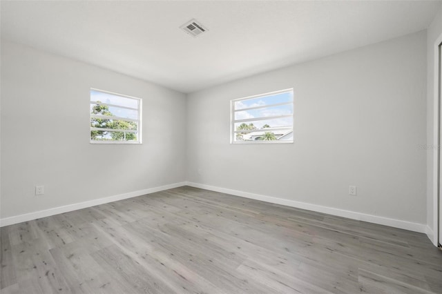 609 Carmel Rd, Venice, FL 34293 - spare room with wood finished floors and baseboards