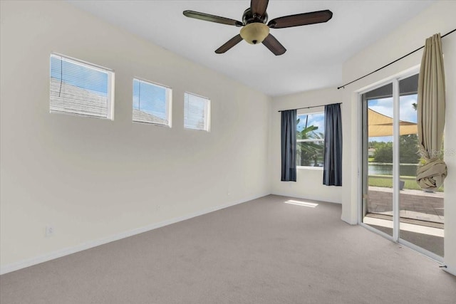 7026 43rd Ave E, Palmetto, FL 34221 - unfurnished room with light colored carpet and ceiling fan