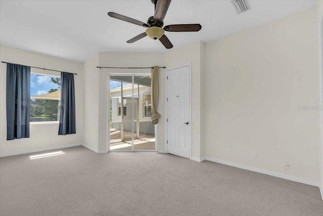 7026 43rd Ave E, Palmetto, FL 34221 - empty room with carpet floors and ceiling fan
