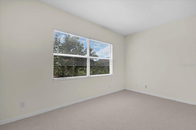 7026 43rd Ave E, Palmetto, FL 34221 - carpeted empty room featuring baseboards