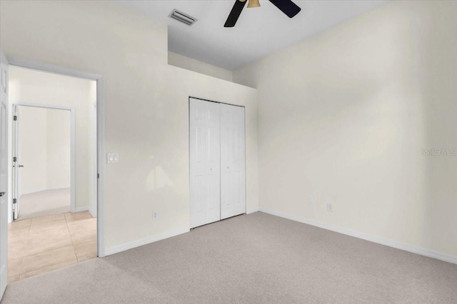 7026 43rd Ave E, Palmetto, FL 34221 - unfurnished bedroom with light carpet, a closet, and ceiling fan