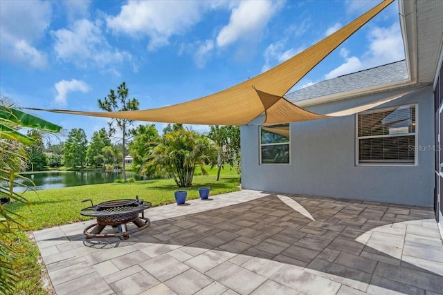 7026 43rd Ave E, Palmetto, FL 34221 - view of patio / terrace featuring an outdoor fire pit and a water view