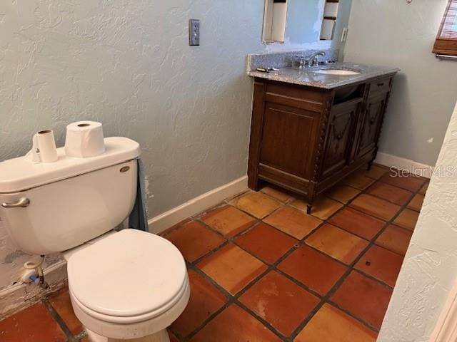 2451 Loma Linda St, Sarasota, FL 34239 - bathroom featuring toilet and vanity