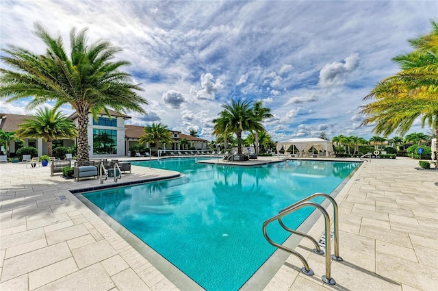 4915 Kiva Cir, Bradenton, FL 34211 - community pool with a patio