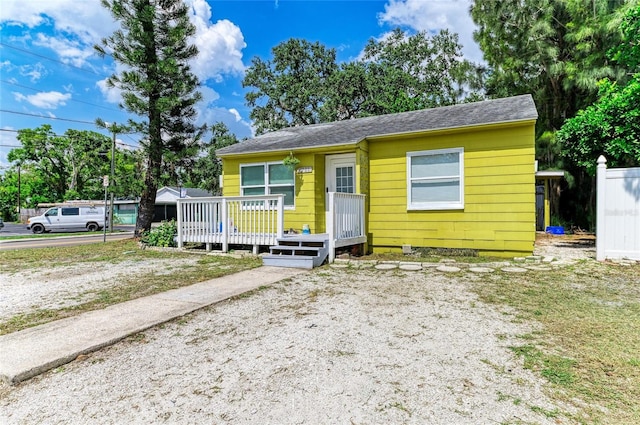 1701 13th St W, Bradenton, FL 34205 - view of front of property with a wooden deck