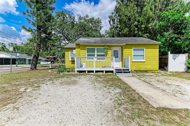 1701 13th St W, Bradenton, FL 34205 - view of front facade with a wooden deck