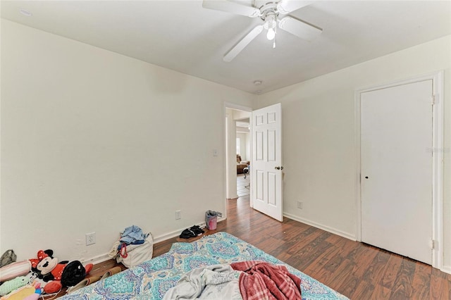 1701 13th St W, Bradenton, FL 34205 - unfurnished bedroom with wood finished floors and a ceiling fan