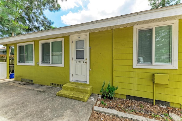 1701 13th St W, Bradenton, FL 34205 - property entrance featuring crawl space