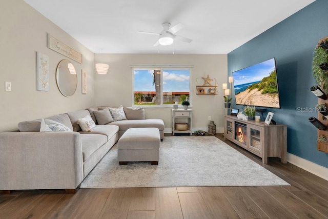 3850 Catalina Dr, Bradenton, FL 34210 - living room featuring a ceiling fan and wood finished floors