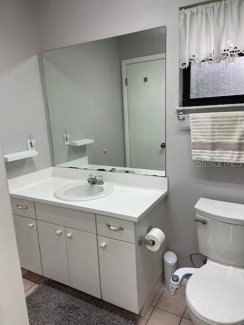 3683 Brown, Arcadia, FL 34266 - bathroom featuring tile patterned flooring and vanity