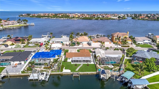 6341 Cocoa Ln, Apollo Beach, FL 33572 - aerial perspective of suburban area with a large body of water