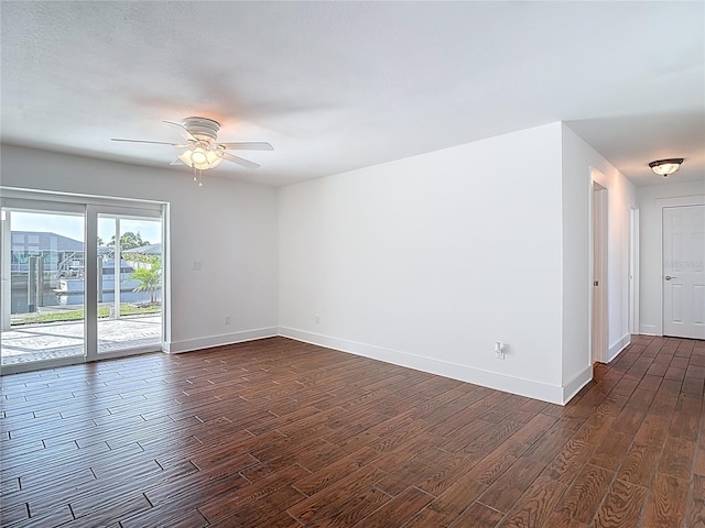 6341 Cocoa Ln, Apollo Beach, FL 33572 - unfurnished room featuring dark wood-style floors and a ceiling fan