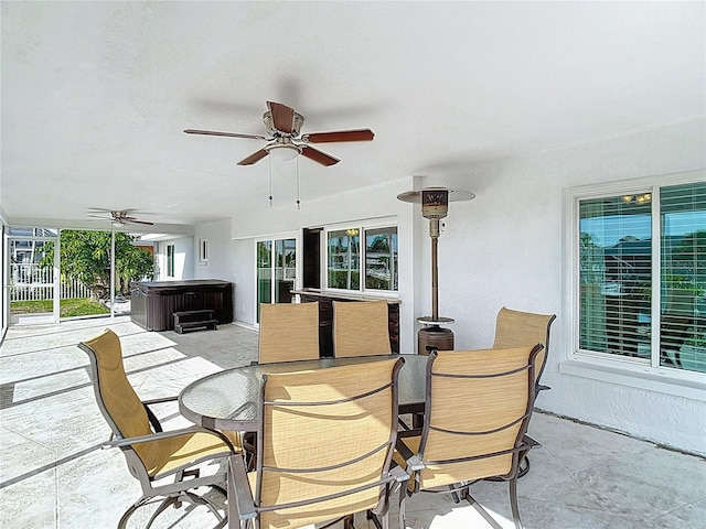 6341 Cocoa Ln, Apollo Beach, FL 33572 - view of patio featuring a hot tub, ceiling fan, and outdoor dining space