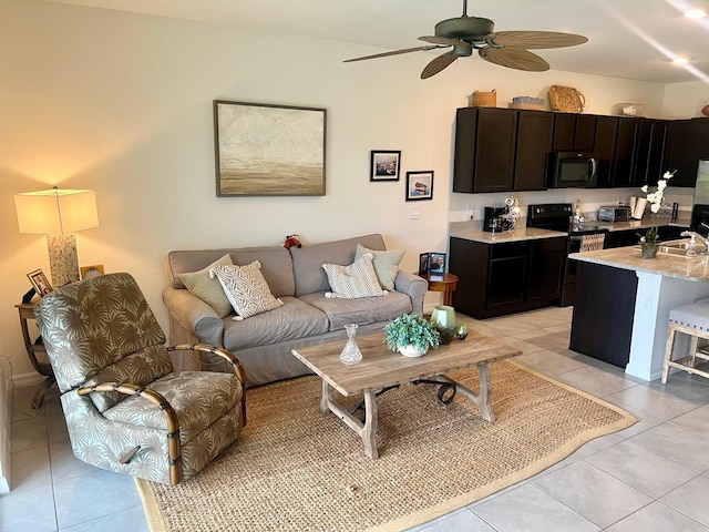 8995 Milestone Dr, Sarasota, FL 34238 - living area featuring light tile patterned floors and ceiling fan