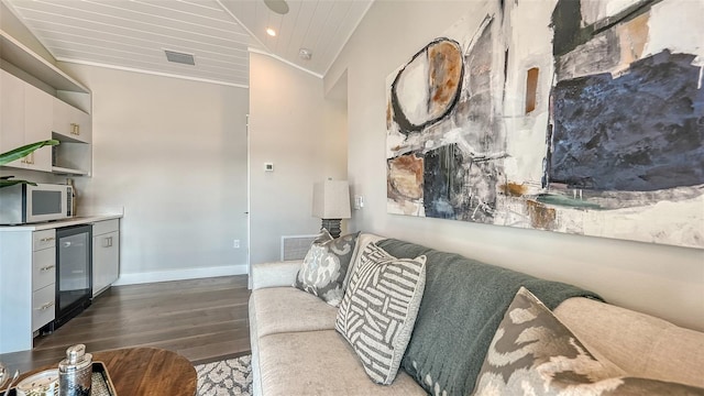8006 20th Pl W, Bradenton, FL 34209 - living room featuring wood finished floors, vaulted ceiling, crown molding, recessed lighting, and beverage cooler