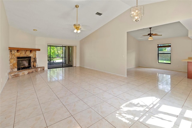 4805 Cypress Lake Ct, Sarasota, FL 34243 - unfurnished living room with ceiling fan, a fireplace, light tile patterned floors, and high vaulted ceiling